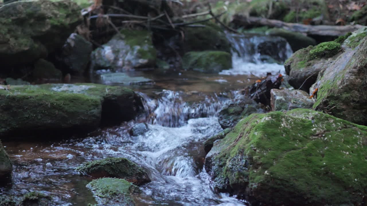Mountain Creek Flowing Between Rocks, Close Up Slow Motion