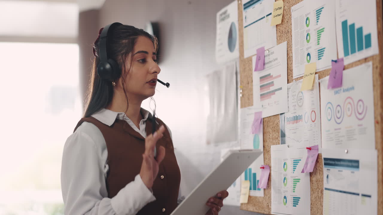 Businesswoman presenting data and strategy in the office