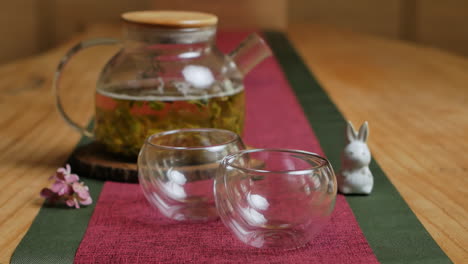 elegant tea setting on wooden table