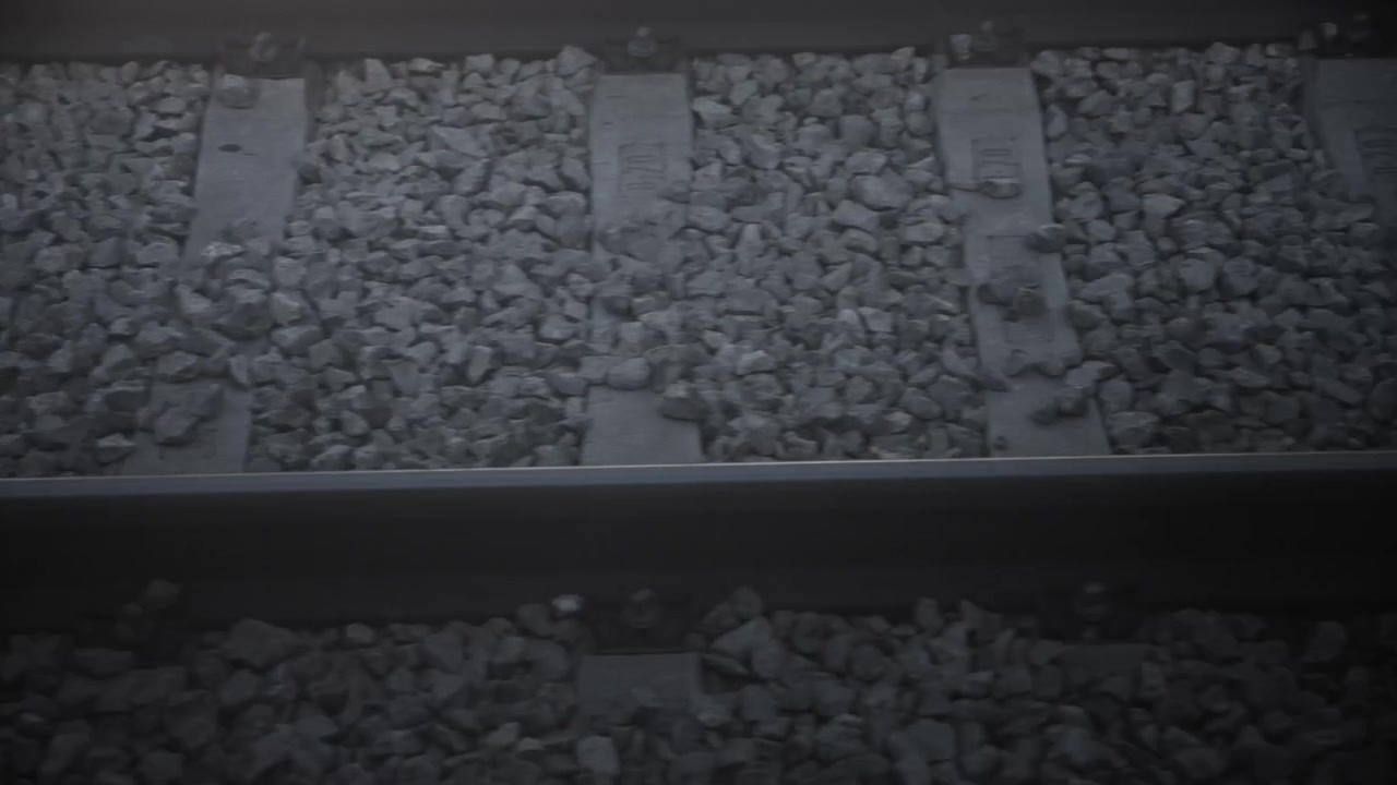 Railroad tracks moving fast