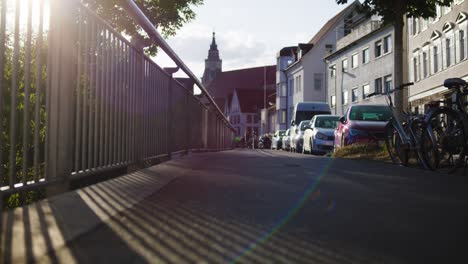 couple walking near church in tubingen, germany in 4k downtown home of europes oldest university at sunset