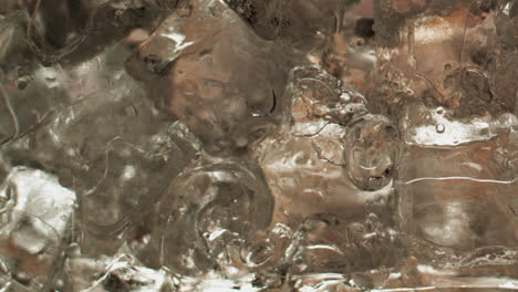 cocktail ingredients on ice cubes extreme close-up-2