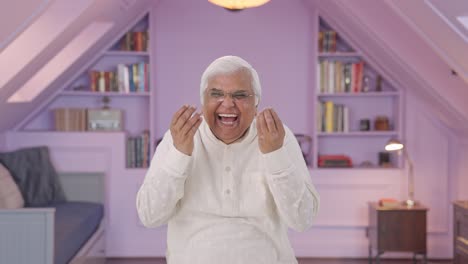 happy indian old man laughing on someone
