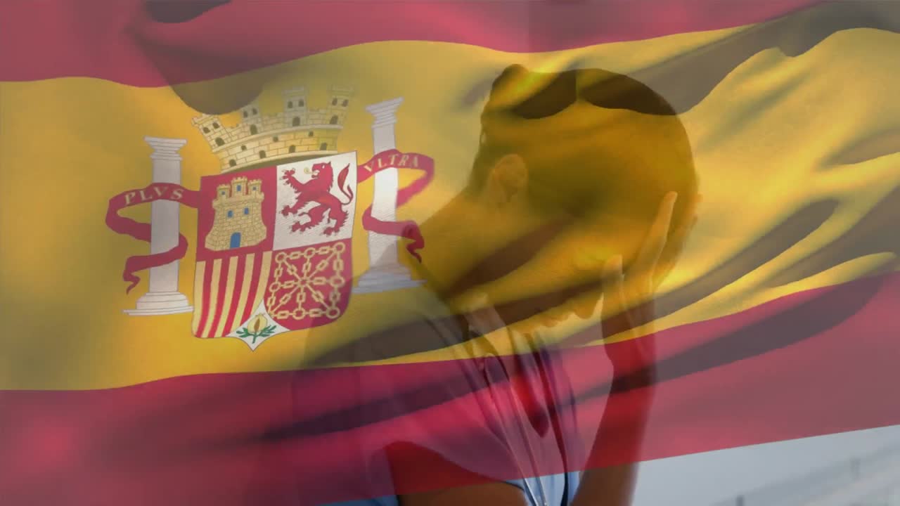 composición digital de la bandera española ondeando contra una trabajadora de salud caucásica estresada en el hospital