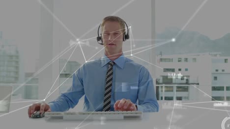 Animation-of-network-of-connections-with-icons-over-businessman-using-phone-headsets