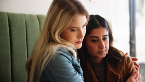 two friends sharing a moment of support