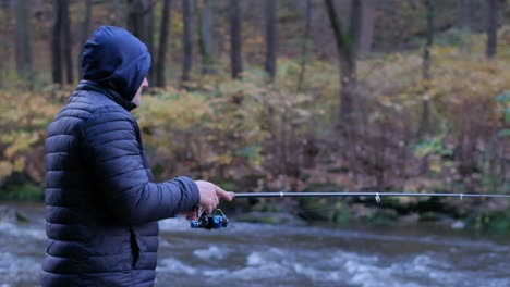 a man fishing on a mountain river fishing concept a man fishing on a mountain river fishing concept