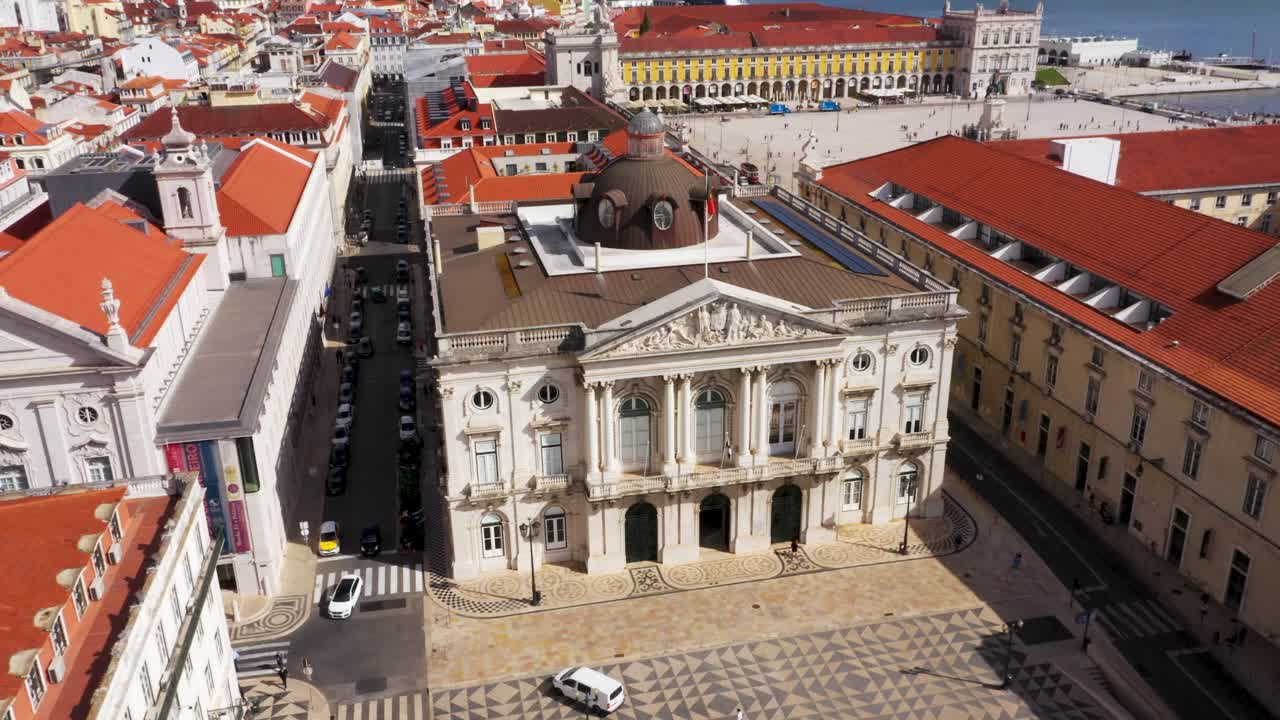 Lisbon City Hall Exterior With Neoclassical Facade. Santa Maria Maior, Lisbon, Portugal. aerial pullback, tilt-down shot