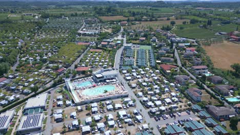 aerial video around the pool of the idealazise camping at lake garda