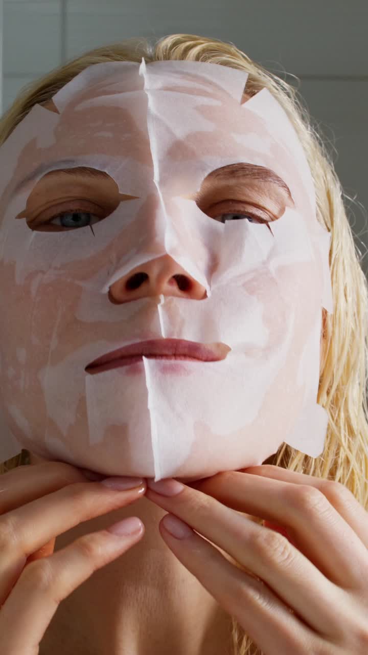 Woman Applying a Sheet Mask