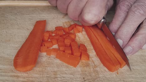 Carrots-being-sliced-and-chopped-in-readiness-for-making-a-home-made-soup