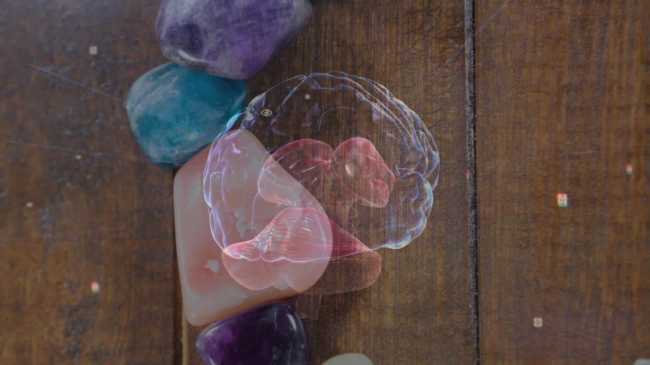 Digital brain hologram hovering over polished stones on wooden plank, showing floating UI elements