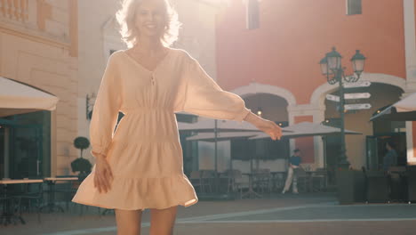 happy woman in a beige dress