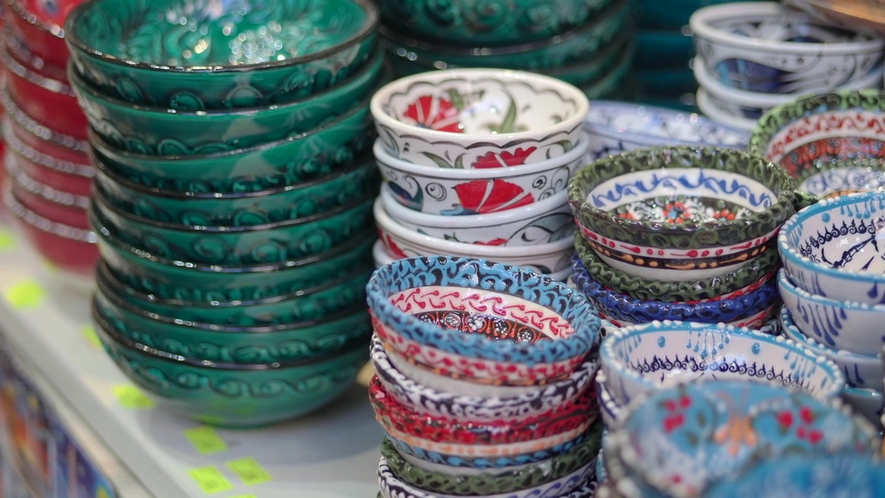Stacks of Traditional Handmade Ceramic Bowls with Vibrant Patterns