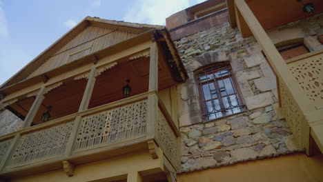 wooden balcony on a stone building