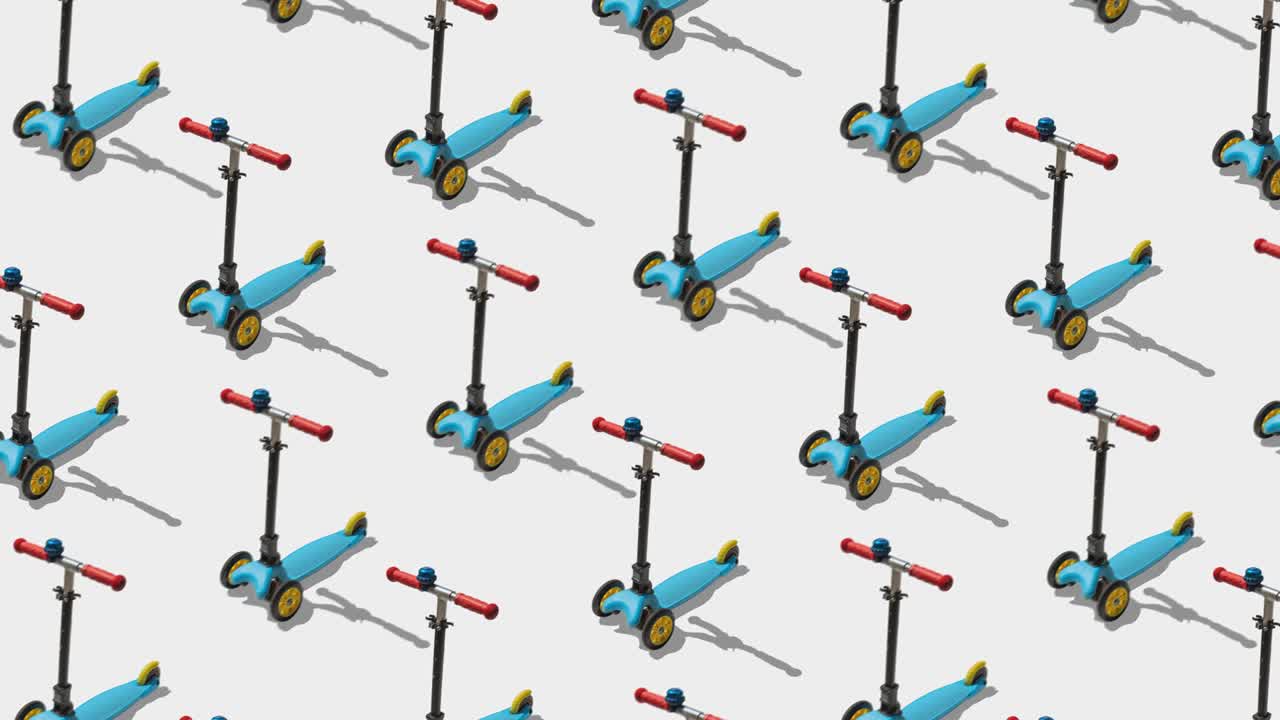 Flat lay composition with set of kick scooters on white background.