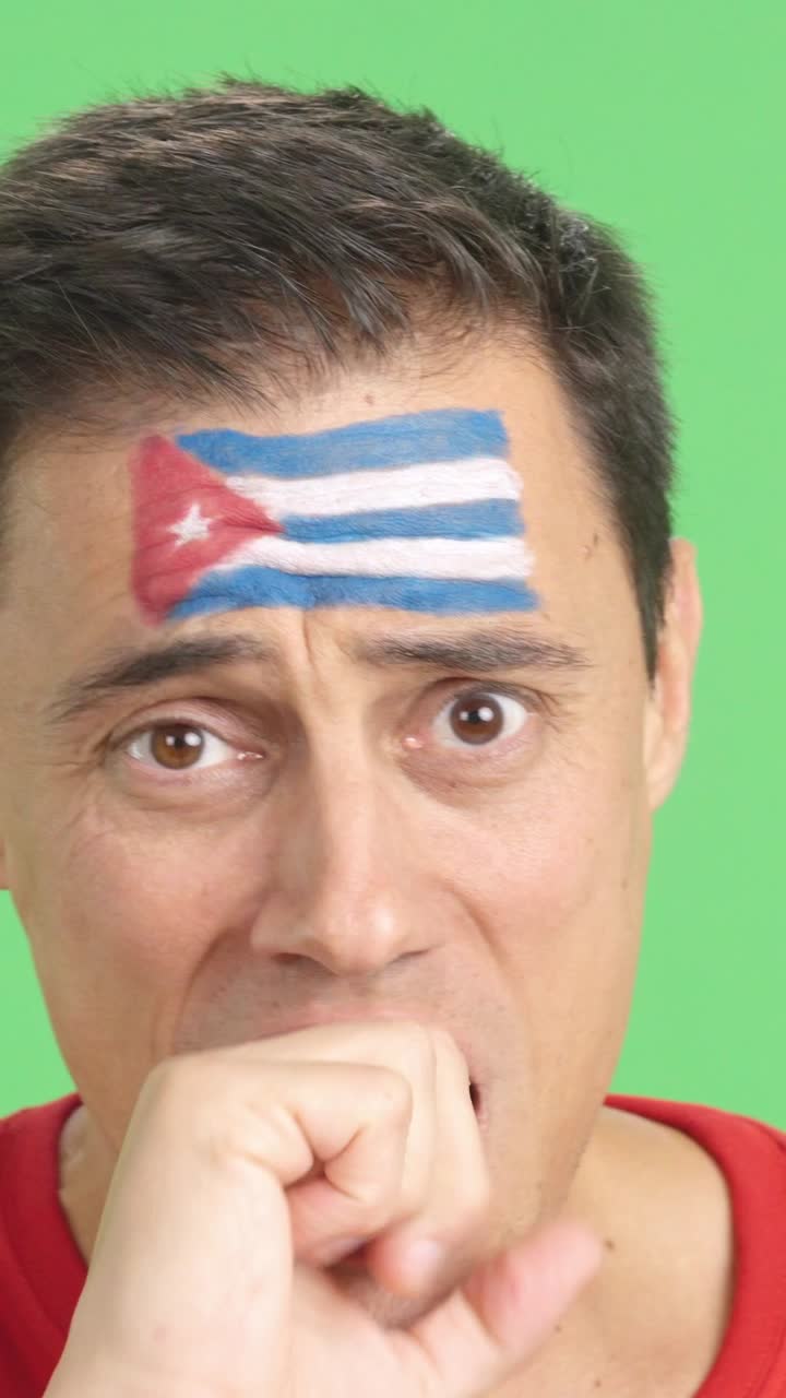 Very nervous man supporting cuban team during a difficult match