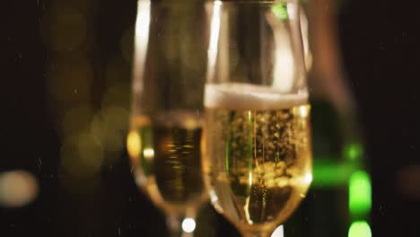 animation of champagne glasses with froth over lens flare at bar