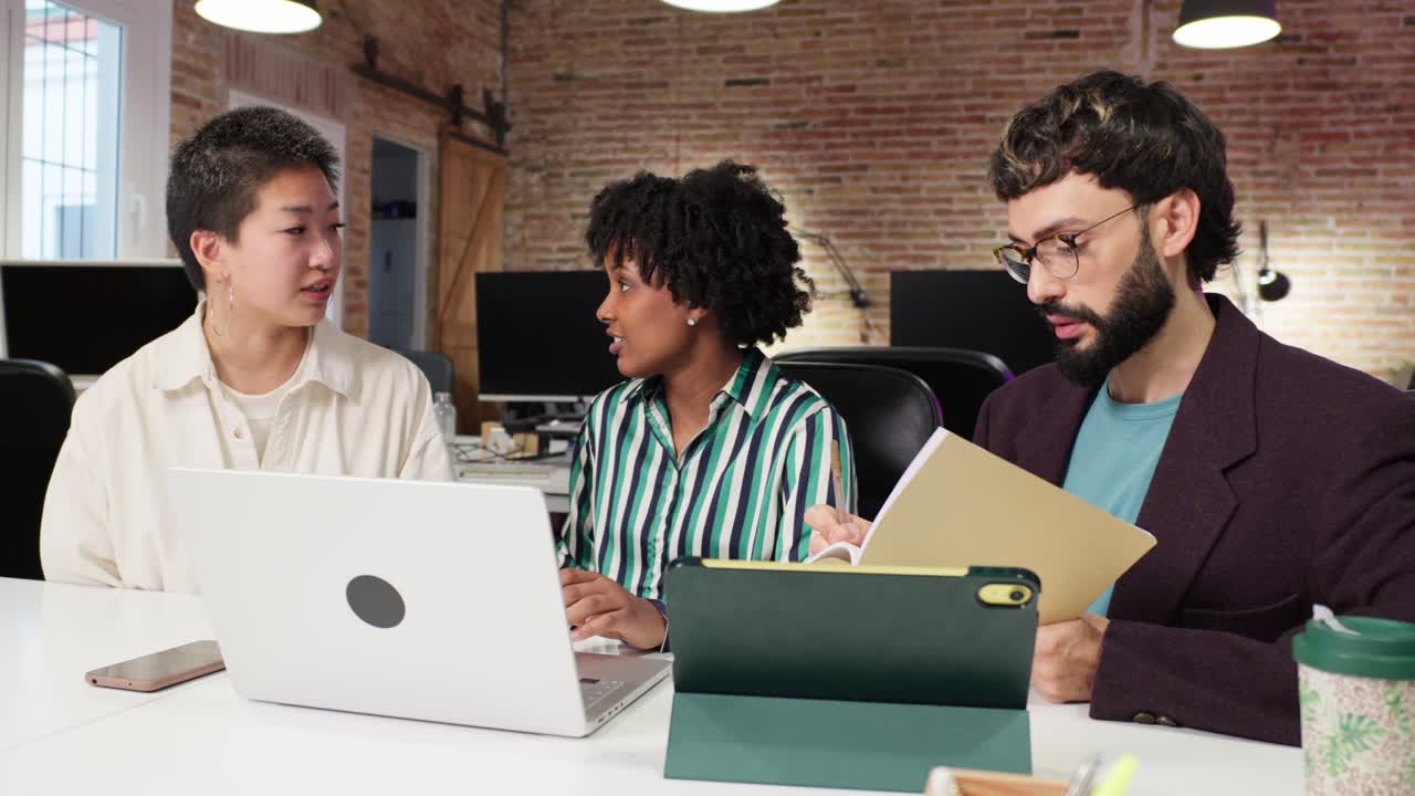 Diverse team collaborating in a modern office