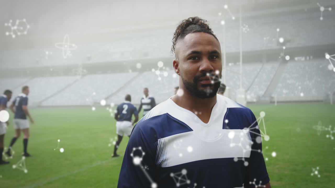 스타디움에서 남성 럭비 선수들에 대한 화학 구조의 애니메이션