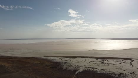 flying over the pink salt lake in anatolia, turkey