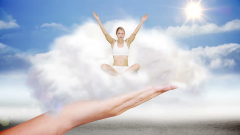 mano gigante presentando mujer haciendo yoga