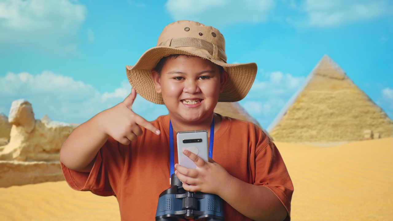 Boy Exploring Egypt on his Smartphone
