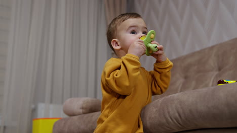baby playing with fidget spinner