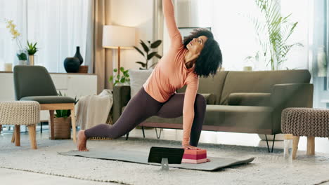 a woman doing yoga at home