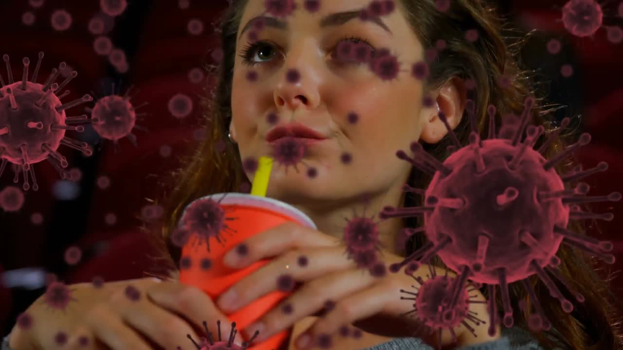 animación de las células de covid 19 sobre la mujer en el cine