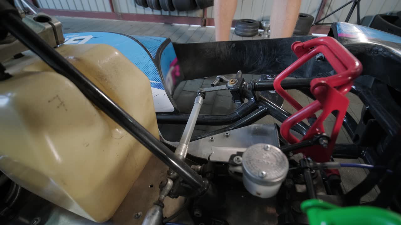 The mechanic go kart racing service change the wheels