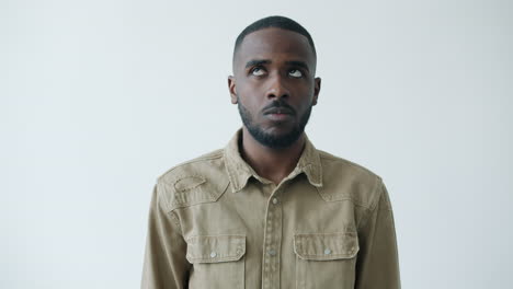 man with a concerned expression