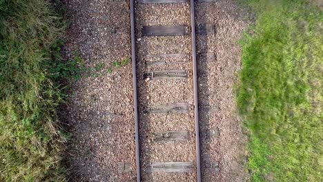 railroad zoom out effect with drone shot from above