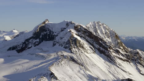 Snow-Covered-Rocky-Valley-Under-Clear-Sky-During-Winter-In-Vancouver,-Pemberton,-Whistler-And-Squamish,-Canada