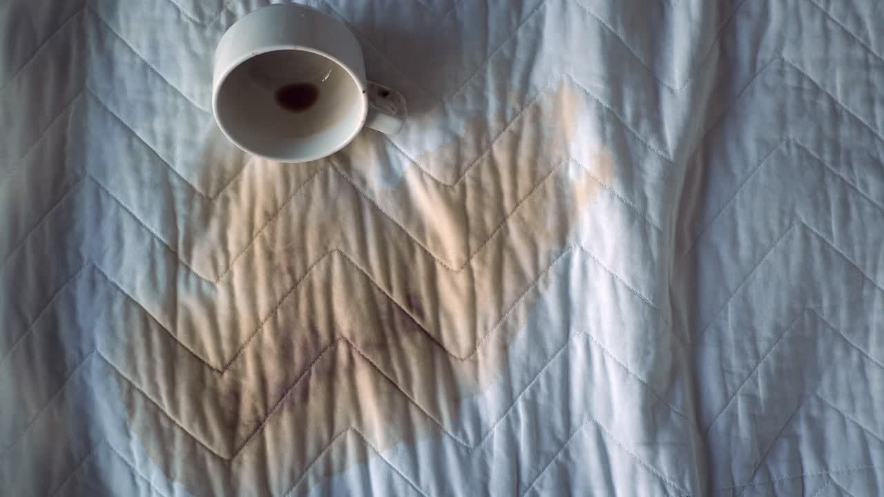 Coffee stain on bed
