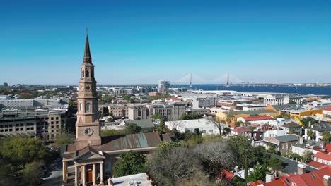 an-orbiting-drone-shot-of-st-Philips-church-in-downtown-charleston-south-carolina