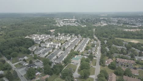 aerial drone view of houses in local neighborhood