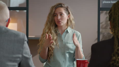 female candidate talking to recruiters on job interview