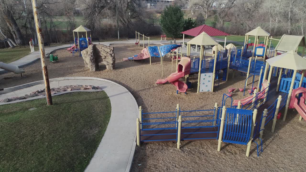 Morning playground park aerial with no children due to COVID virus