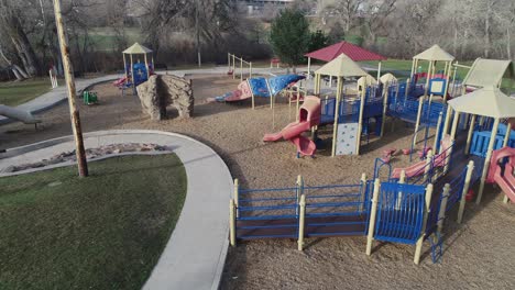 morning playground park aerial with no children due to covid virus