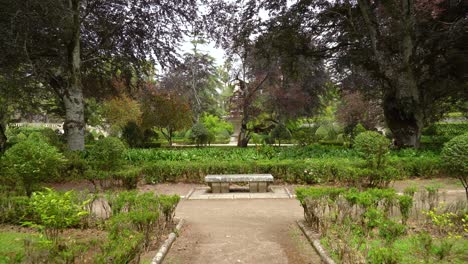 stone benches in botanical garden of the university of coimbra