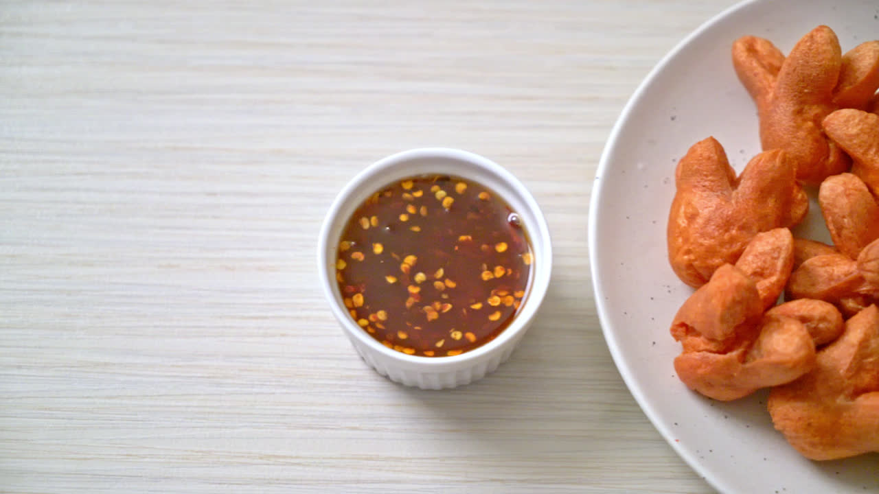 deep fried sausage with dipping sauce