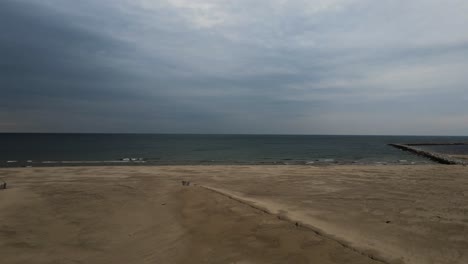 a desolate beach on a dreary winter day