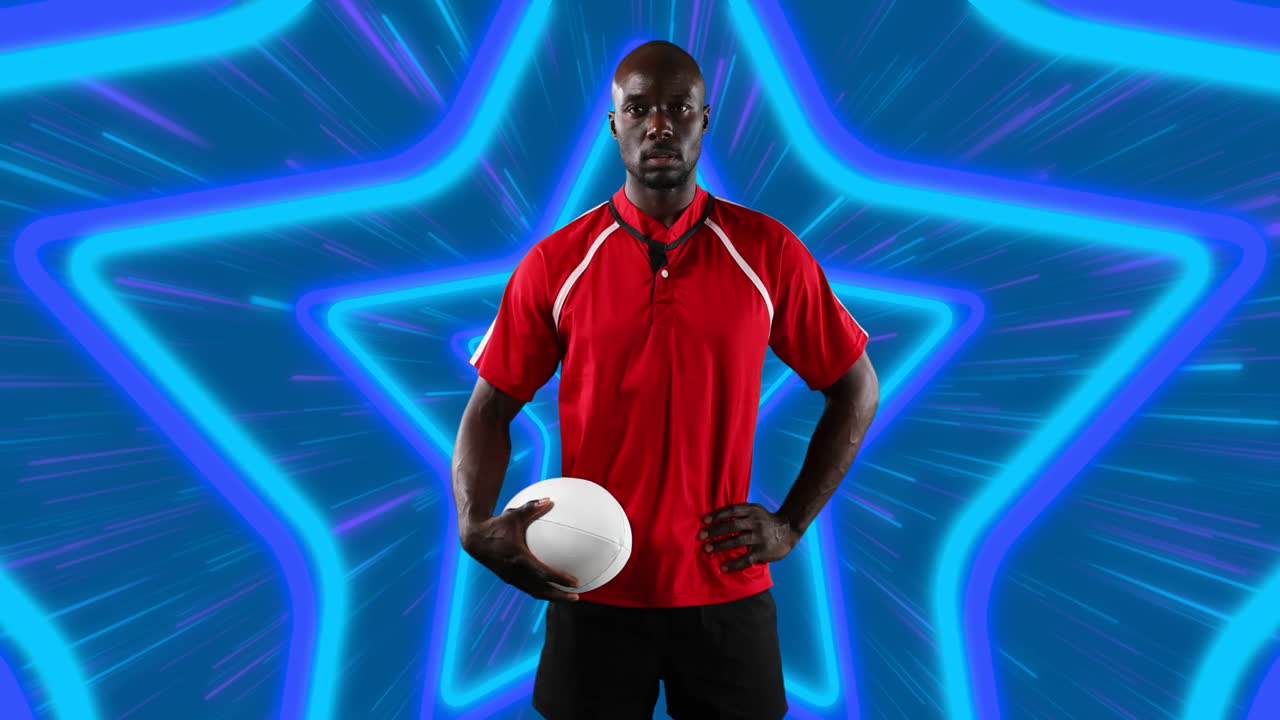 African american male rugby player holding rugby ball against neon star shapes in seamless pattern