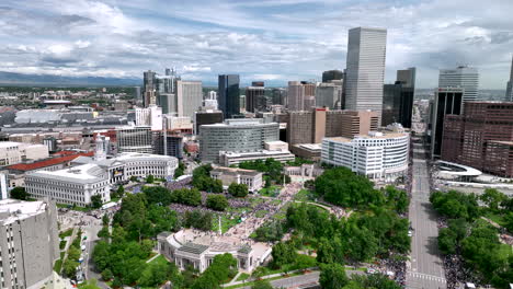 denver aerial skyline view with nuggets fans in civic center park celebrating