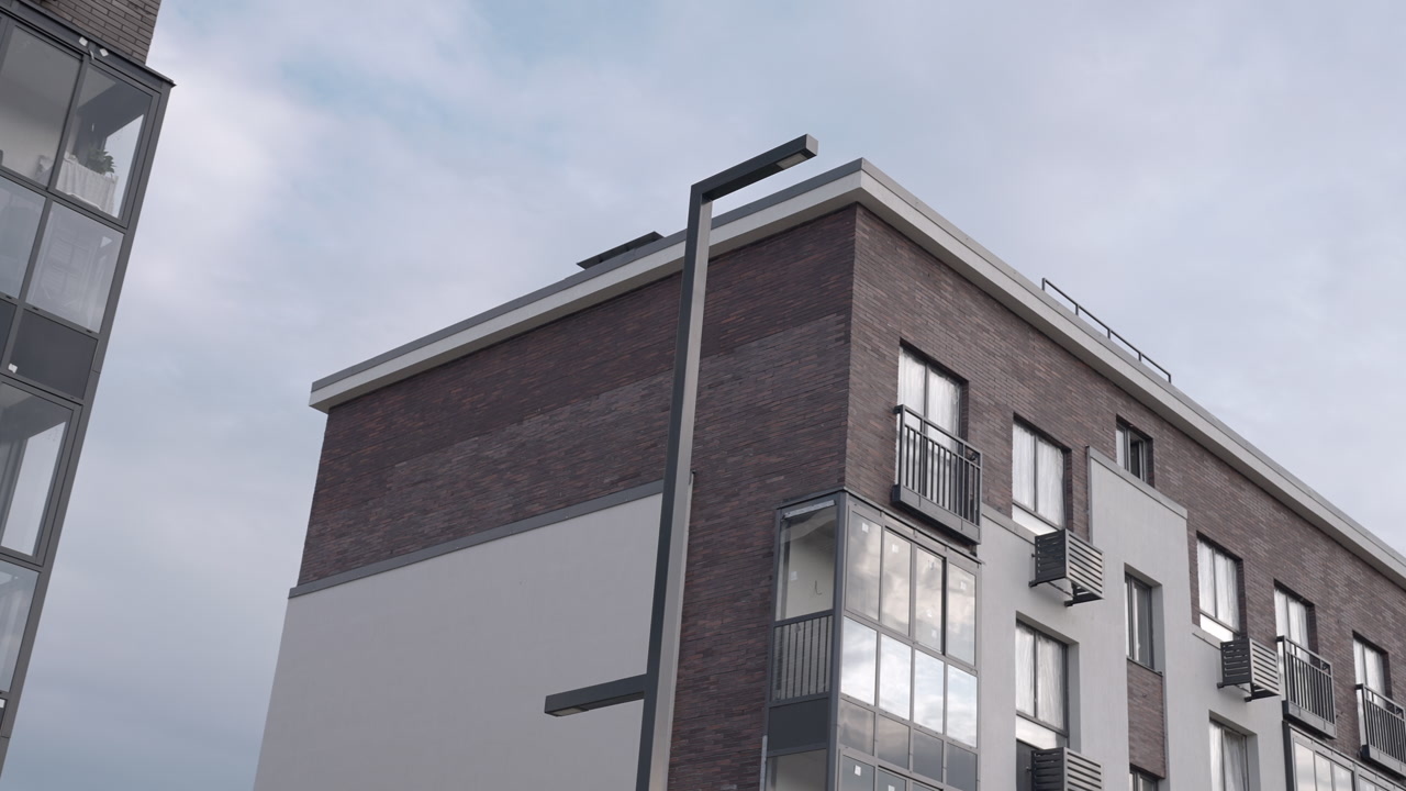 Contemporary Apartment Facade With Rooftop Detail And Glass Balcony, Brick And Cladding Textures Visible