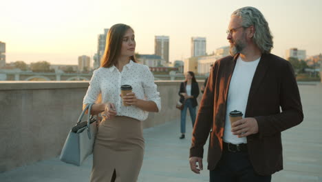 business people discussing over coffee