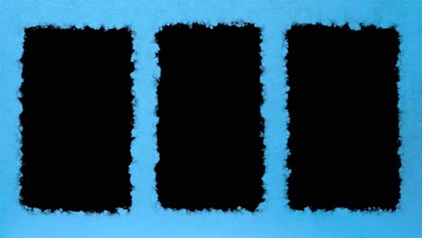 Three-vertical-black-boxes-for-video-or-image-in-video-with-light-blue-gradient-textured-paper-background,-ready-for-luma-key