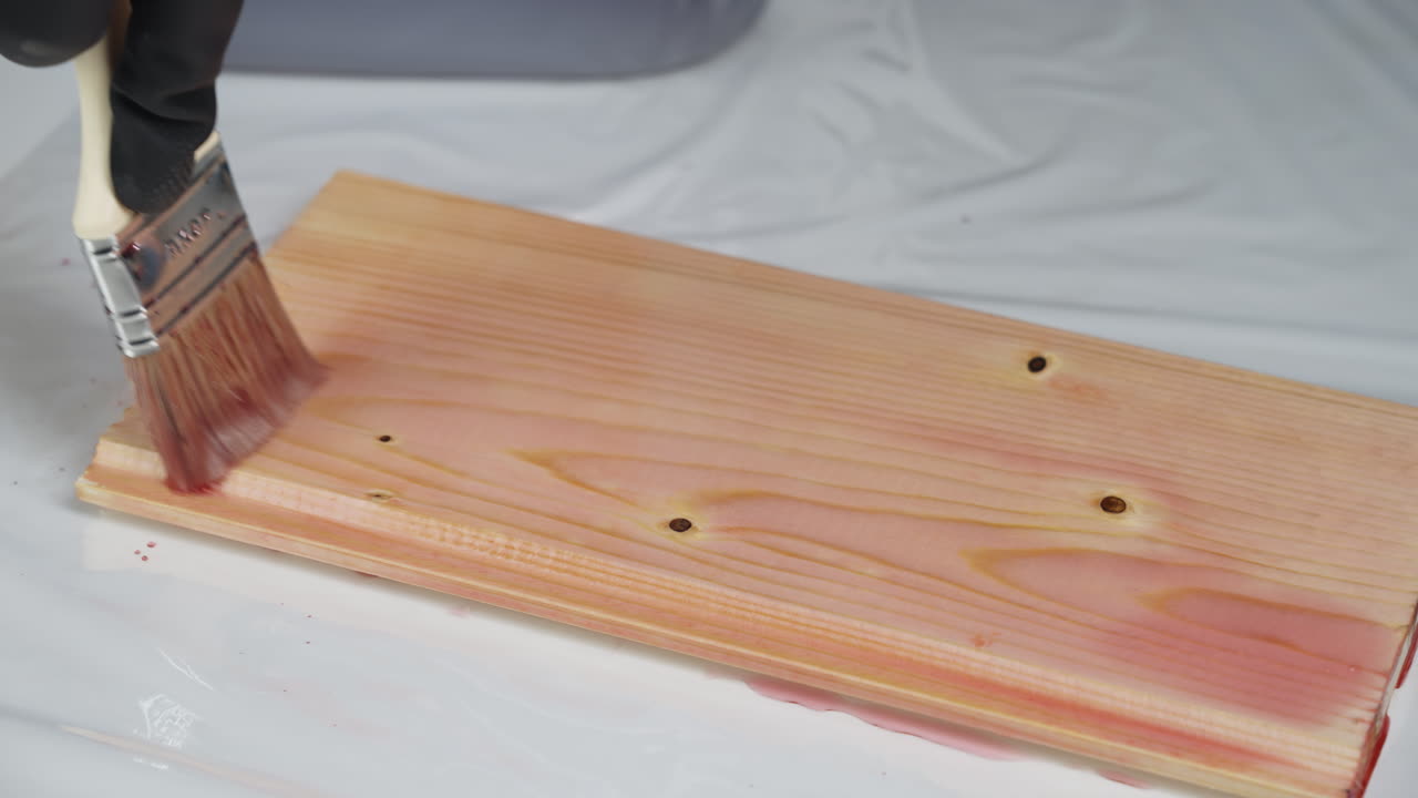 Painting a Wood Plank with Red Stain