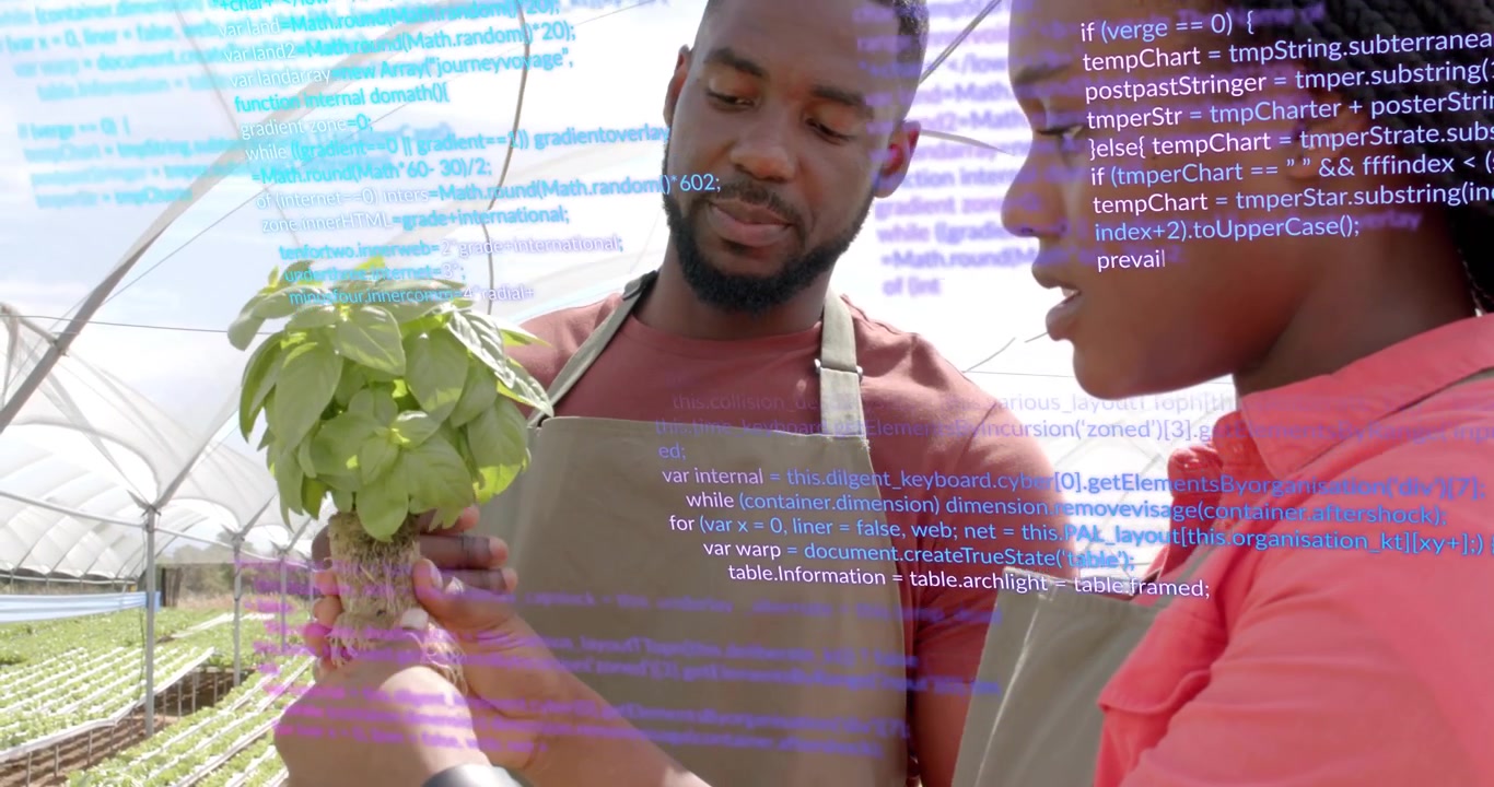 Man lifting seedling from greenhouse bench and woman analyzing plant health with code overlay